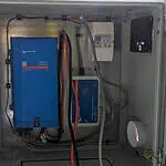 Victron MultiPlus inverter and battery system installed in weatherproof electrical enclosure for off-grid solar application