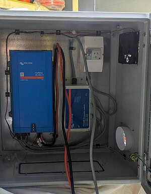 Victron MultiPlus inverter and battery system installed in weatherproof electrical enclosure for off-grid solar application
