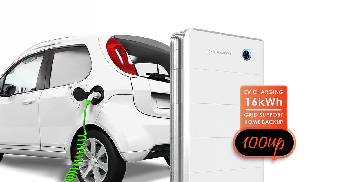 White electric vehicle connected to large battery storage unit via green charging cable on black background