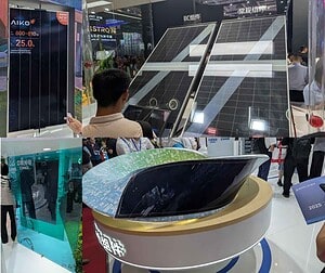 Trade show booth displaying curved solar panels and efficiency specifications at Chinese solar technology exhibition