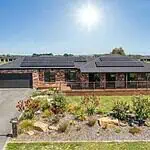 4-bedroom Victorian residential home during the day with an 18.9 kW off-grid solar array installed
