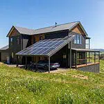 5-bedroom Victorian residential home during the day running on an off-grid solar kit