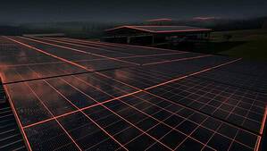 Large-scale solar panel array with glowing orange outlines at dusk, extending across a rural landscape with a utility building and forested hills in the background